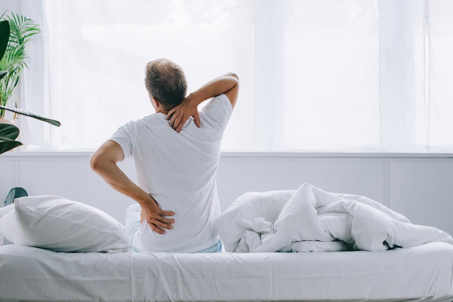 dolor de espalda tratamientos sintomas causas quiropractico fisioterapia nutricion rumeni santizo